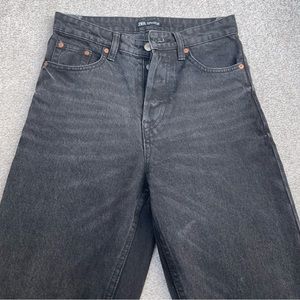 Zara women's black high-waisted straight-leg jeans.